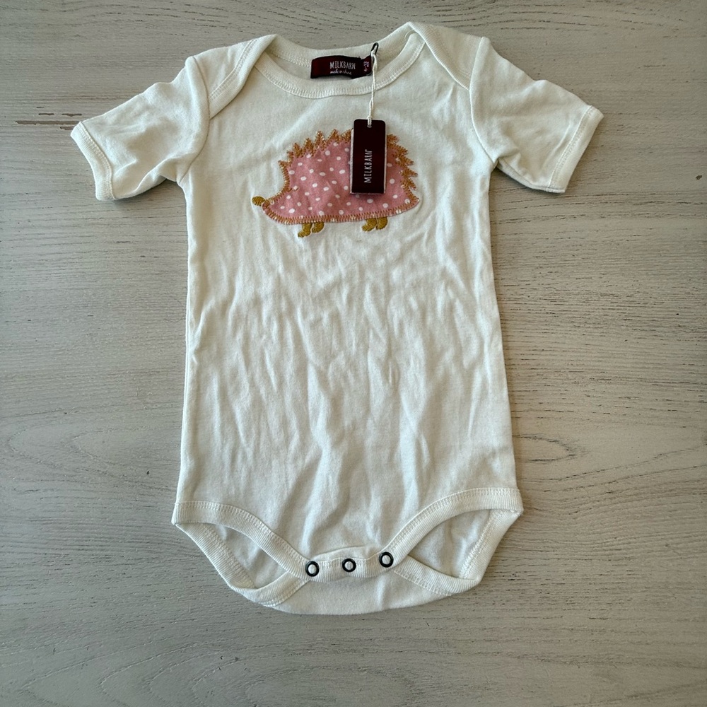 Milk Barn Cream Baby Onesie with Pink Hedgehog. 6 - 12 months.
